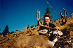 Jack with a mule deer buck